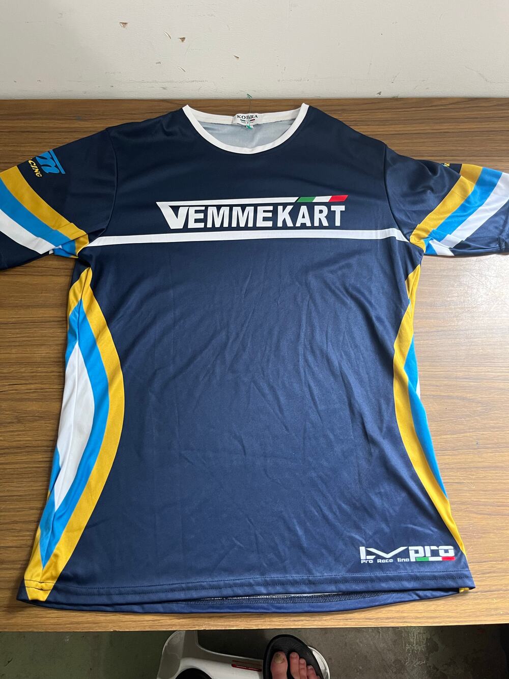 Kobra Vemmekart short sleeve racing jersey in navy with white trim and striped s